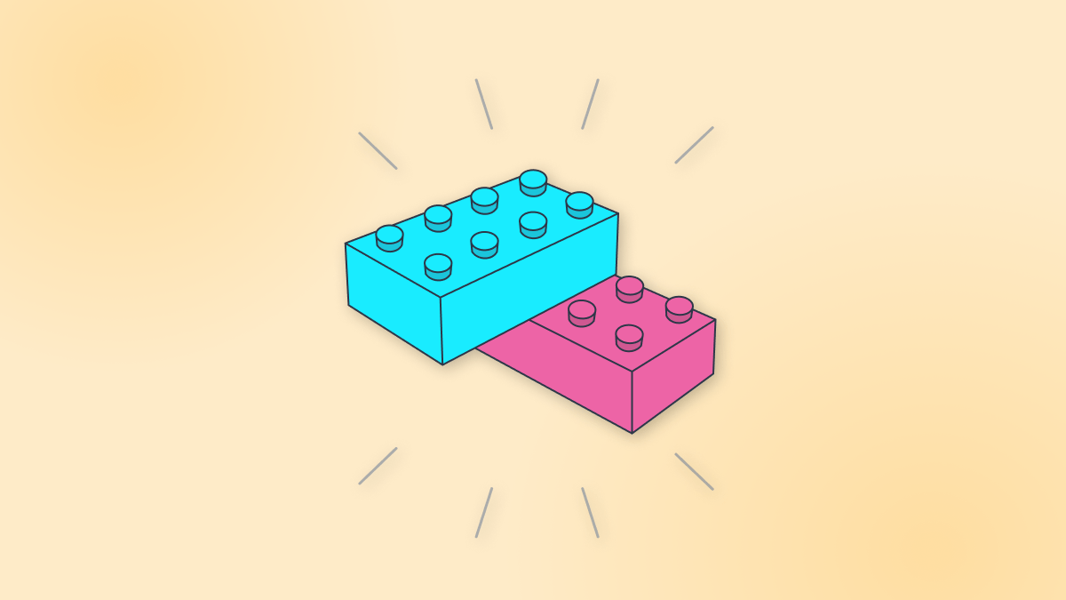 Two toy lego bricks being clicked together